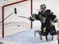 Edmonton Oil Kings Travis Child is scored on by Red Deer Rebels Jared Dmytriw during third period WHL action on Sunday September 24, 2017 in Edmonton.