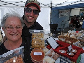 Ernesto Rizzi is seen in this 2013 photo with his mother Caterina, at her farmers market booth, Pasta by Caterina.