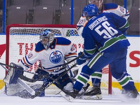 PENTICTON,BC:SEPTEMBER 11, 2017 -- Vancouver Canucks Guillaume Brisebois (right) is stopped by Edmonton Oilers goalie Shane Starrett during NHL preseason hockey action at the Young Stars Classic held at the South Okanagan Events Centre in Penticton, BC, September, 11, 2017. (Richard Lam/PNG) (For ) 00050537A
RICHARD LAM Ed Kaiser, PNG