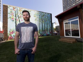 Leigh Wright, producer of Vignettes Design Series, stands in front of a new mural by local artist Giselle Denis, and beside a pop-up restaurant space at the heart of Vignettes Does Dining.