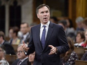 Finance Minister Bill Morneau rises during question period in the House of Commons on Parliament Hill in Ottawa on Tuesday, Sept.26, 2017.