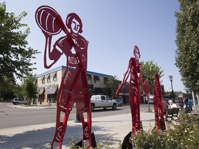 Statues of the the Edmonton Grads basketball team line Alberta Avenue in Ward 7.