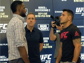 Mixed martial arts fighters Neil Magny (left) and Rafael dos Anjos (right) pose for photos at Rogers Place in Edmonton on Wednesday September 6, 2017. They will fight at Ultimate Fighting Championship (UFC) 215 in Edmonton on September 9, 2017.