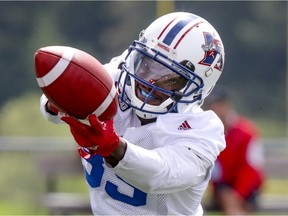 Montreal Alouettes receiver T.J. Graham, who is expected to get a second look against the Eskimos on Monday, reaches for the football during training camp at Bishops University in Lennoxville on May 29, 2017.