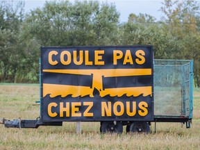 A sign protesting the TransCanada Energy East Pipeline Project that reads "Don't spill in our home" sits on a field near Highway 40 in the small town of Donnacona, 226 kilometres east of Montreal on Tuesday, September 29, 2015. File photo.