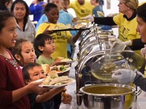 Hundreds of low income families from West Edmonton attended the Family Thanksgiving Dinner & Celebration hosted by the Kids On Track Association of Edmonton (KOT), October 7, 2017. Ed Kaiser/Postmedia