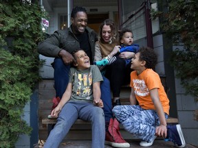 Chile Lipscombe, Tripp Lipscombe, Jesse Lipscombe, Julia Lipscombe and Indiana Lipscombe pose for a photo outside their home in Edmonton on Thursday, Oct. 12, 2017.