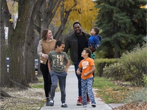 Chile Lipscombe, Tripp Lipscombe, Jesse Lipscombe, Julia Lipscombe and Indiana Lipscombe outside their home in Edmonton on Thursday, Oct. 12, 2017.