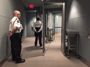 Security officials with the new metal detectors at City Hall.