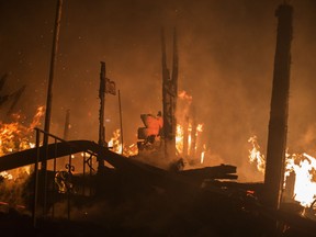 A structure burns in the early morning hours on October 14, 2017 in Sonoma, California.