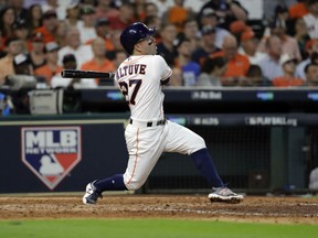 Jose Altuve of the Houston Astros connects for his third homerun of the game leading the Astros to an 8-2 win over the Boston Red Sox in Game 1 of the ALDS Thursday in Houston. Game 2 is Friday.