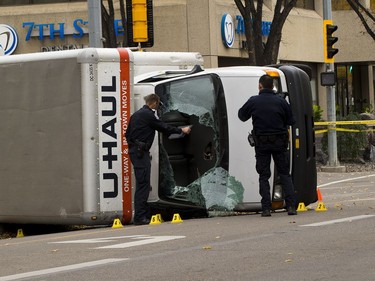 Police investigate a U-Haul truck on 100 Avenue near 106 Street driven by a 30 year old man that was involved in 'acts of terrorism' after an EPS officer was stabbed and pedestrians run down. Taken on Sunday October 1, 2017 in Edmonton. Greg  Southam / Postmedia