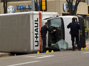 Police investigate a U-Haul truck on 100 Avenue near 106 Street driven by a 30 year old man that was involved in 'acts of terrorism' after an EPS officer was stabbed and pedestrians run down. Taken on Sunday Oct. 1, 2017 in Edmonton.