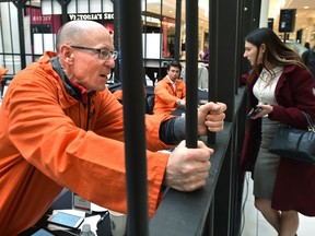 Jailbird John Lilley wants out as he takes part in the Caught by Crime Stoppers Jail Bailout, their annual fundraiser at Southgate Mall in Edmonton, Oct. 26, 2017. He needed to raise $2,000 to get out of jail.
