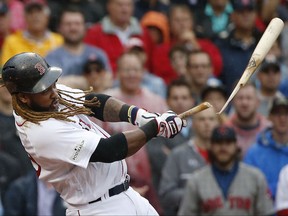 Boston Red Sox designated hitter Hanley Ramirez breaks his bat during the third inning in Game 4 of baseball's American League Division Series against the Houston Astros on Oct. 9, 2017, in Boston.