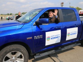 UCP leadership candidate Jason Kenny waves from his truck after speaking at a media event at the Blackfoot Diner in Calgary on Tuesday Aug 1, 2017.