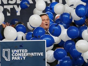 Jason Kenney is covered in balloons as he celebrates after being elected leader of the United Conservative Party. The leadership race winner was announced at the BMO Centre in Calgary on Saturday, Oct. 28, 2017.