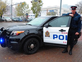 Edmonton Police Service Const. Scott Anthony with the Ford Police Interceptor Utility (Explorer) in Edmonton on Oct. 10, 2012. The new police vehicles are not equipped with video camera or audio recording technology.