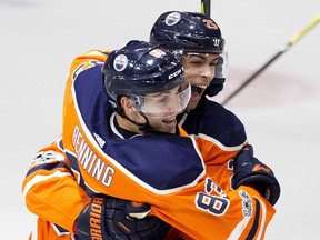 Edmonton Oilers Matthew Benning (83) celebrates his goal with teammate Darnell Nurse (25) against the Dallas Stars during third period NHL action on Thursday October 26, 2017, in Edmonton.