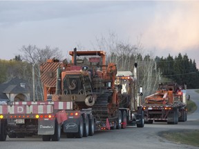 A police roadblock on Crozier Avenue in Sturgeon County near a CN derailment that forced the evacuation of 46 homes in the Sturgeon Valley area on Sunday, Oct. 22, 2017.