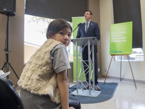 Alice Iveson, Don Iveson's daughter, sits in the front row while her dad makes his last policy announcement of the campaign Tuesday, Oct. 10, 2017.