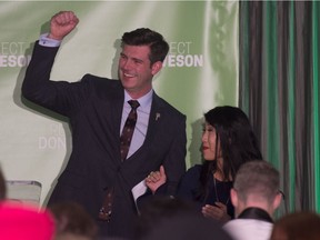 Edmonton Mayor elect Don Iveson speaks to his supporters at the Matrix Hotel after winning the Mayors chair for a second term  on Oct. 16, 2017. By his side was his partner Sarah Chan.
