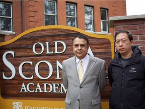 Tahir Choudhry, left, and Darrell Lu of Old Scona Academic High School's parent council argue a gymnasium should be a basic requirement for any school. Old Scona has never had a gym, but  parents hope to get one built for future students. The pair stand outside the school on Oct. 20, 2017.