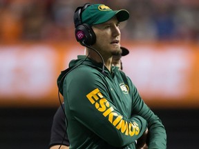 Edmonton Eskimos head coach Jason Maas watches from the sideline during CFL action against the B.C. Lions on Oct. 21, 2017, in Vancouver