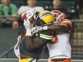 B.C. Lions defensive-back Buddy Jackson tries to block the catch by Edmonton Eskimos slotback D'haquille Williams during second half CFL action in Edmonton, Alta., on Friday July 28, 2017.