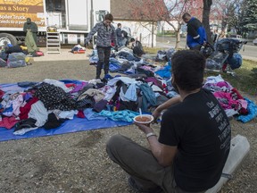 The Intricate Group and Harvest Oilfield Service served a hot lunch and handed out warm winter clothing to the homeless on the street on October 28, 2017.