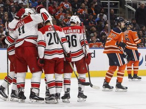 Carolina Hurricanes players celebrate a goal against the Edmonton Oilers during first period NHL action in Edmonton, Alta., on Tuesday October 17, 2017. THE CANADIAN PRESS/Jason Franson ORG XMIT: EDM110
JASON FRANSON,