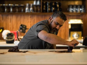 Chef Rafael D'Alcazar runs the kitchen at The Holy Roller in Edmonton. Photo credit: Morgan Gold.