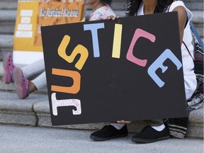 Demonstators calling for justice in the Serenity case rally at the Alberta Legislature in Edmonton, Alberta on Wednesday, Sept. 27, 2017.