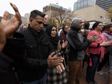 Edmontonians participate in the Stand Together Against Violence in Solidarity with EPS vigil organized by Alberta Muslim Public Affairs Council at Churchill Square in Edmonton, Alberta after a police officer and four bystanders were injured in a terrorist attack on Sunday, October 1, 2017.