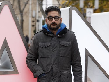 MC Aurangzeb Qureshi poses for a photo before the Stand Together Against Violence in Solidarity with EPS vigil organized by Alberta Muslim Public Affairs Council at Churchill Square in Edmonton, Alberta after a police officer and four bystanders were injured in a terrorist attack on Sunday, October 1, 2017.