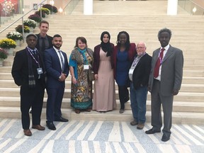 Members of the committee for the Safety Summit Unity Celebration, from left: Ibrahim Shurif, Phillip Telfer, Fadhl Abughanem, Lise Robinson, Fatmeh Kalouti, Nathalie Gahimbare, Brian Gibbon and Ahmed, Abdulkadir at Edmonton City Hall on Friday, Oct. 27, 2017.