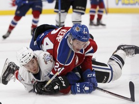 Edmonton's Brett Kemp (24) crashes into Victoria's Ralph Jarratt (4) during the first period of a WHL game between the Edmonton Oil Kings and the Victoria Royals at Rogers Place in Edmonton, Alberta on Wednesday, October 18, 2017.