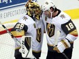 Goaltender Marc-Andre Fleury, left, and James Neal of the Vegas Golden Knights celebrate a 2-1 victory over the Dallas Stars in their NHL debut Friday at the American Airlines Center in Dallas. Neal had both goals and Fleury stopped 45 of 46 shots in their historic victory.