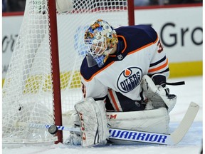 Edmonton Oilers goalie Cam Talbot (33) makes a save during the first period of an NHL hockey game against the Chicago Blackhawks Thursday, Oct. 19, 2017, in Chicago.