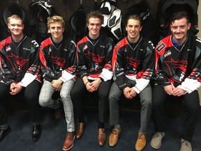 Edmonton Oil Kings (left to right) Conner McDonald, Davis Koch, Will Warm, Colton Kehler and Travis Child wear the team's special edition Star Wars themed jersey in the locker room on Monday, Oct. 30, 2017. The Oil Kings will wear the Jerseys against the Saskatoon Blades on Saturday, Nov. 4.