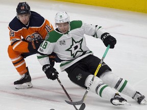 Edmonton Oilers Ryan Strome (18) checks Dallas Stars Tyler Pitlick (18) during first period NHL action on Thursday October 26, 2017, in Edmonton.