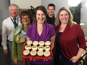 The Press Gallery podcast team from the Edmonton Journal celebrate the 200th episode with cupcakes. From L, Graham Thomson, Paula Simons, Emma Graney, Shaughn Butts, and Sarah O'Donnell.