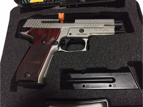 A Sig Sauer P226R Elite 9mm pistol was one of three weapons stolen from a vehicle in Swan Hills on Oct. 18, 2017. Supplied