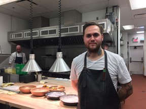 Chef Tony Krause in the kitchen at Revel, located in the Alberta Hotel.