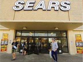 Shoppers exit Sears Canada store on Friday October 20, 2017 at Lansdowne Place mall in Peterborough, Ont. Liquidation has begun as Sears shuts down, including the Peterborough store.