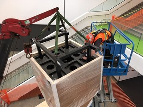 Brenda Draney was commissioned by MacEwan University and the Alberta Foundation for the Arts in 2015 to develop a permanent art installation in Allard Hall. On Tuesday, Oct. 3, 2017 a small work crew installed one of three components of the work titled Trapline, to the ceiling of the university's new $180-million home to its faculty of fine arts and communication.