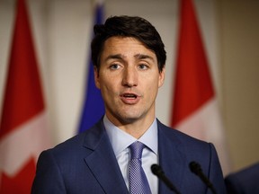 Prime Minister Justin Trudeau speaks during a media availability at the Fairmont Hotel Macdonald in Edmonton, Alta., on Saturday, Oct. 21, 2017.