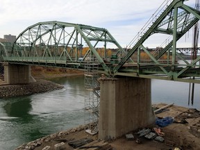 After more than 100 years of service, the old Walterdale Bridge in downtown Edmonton is now under demolition. Major demolition work will begin this weekend (October 21, 22, 2017). (PHOTO BY LARRY WONG/POSTMEDIA)
Larry Wong, Photo by Larry Wong/Postmedia