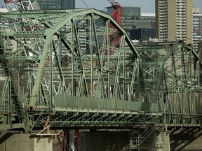 After more than 100 years of service, the old Walterdale Bridge in downtown Edmonton is now under demolition. Major demolition work will begin this weekend (October 21, 22, 2017). (PHOTO BY LARRY WONG/POSTMEDIA)