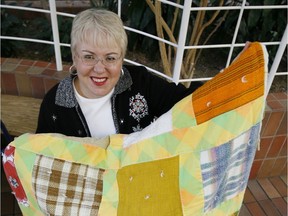 Sheila Ethier, founder of Blankets of Love Foundation for Mental Health, is pictured with the quilt from her grandmother that inspired the foundation, in this December 2007 file photo.